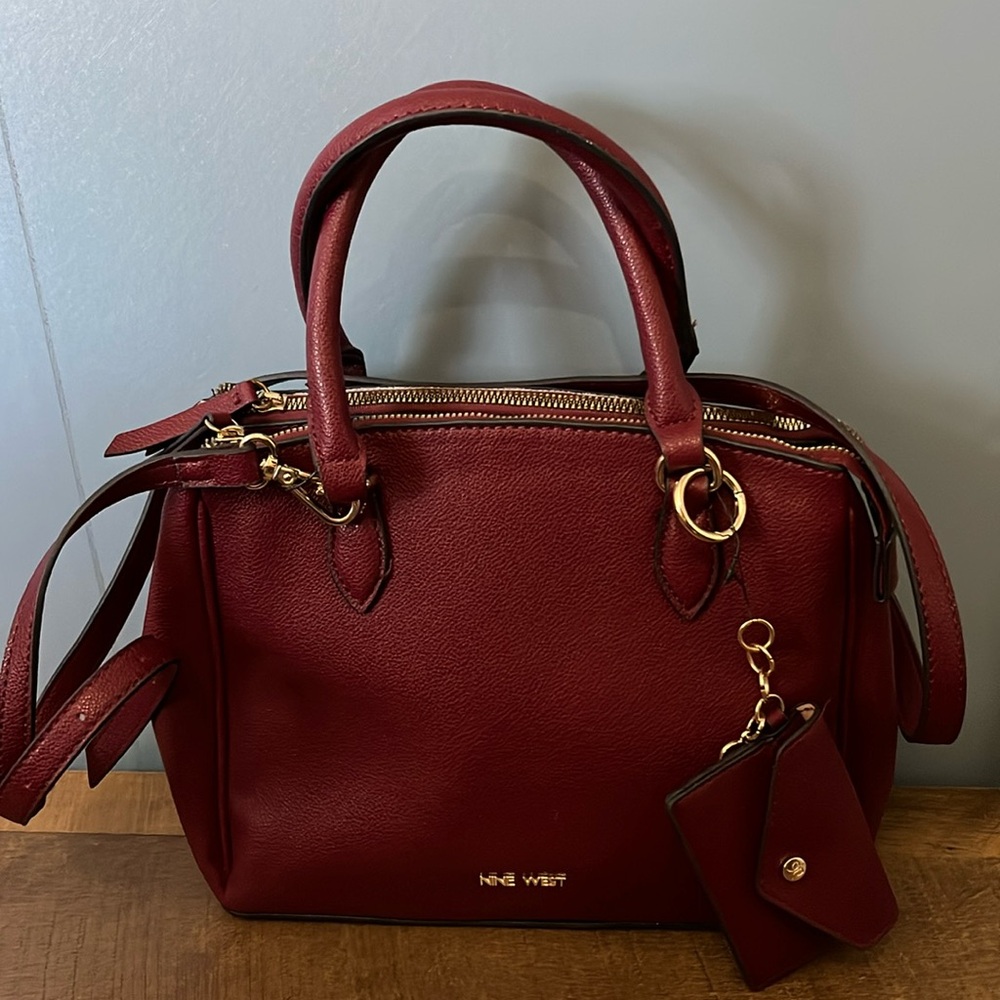 NEW without tags Burgundy Nine West Body Bag. Double zipper with cute coin purse